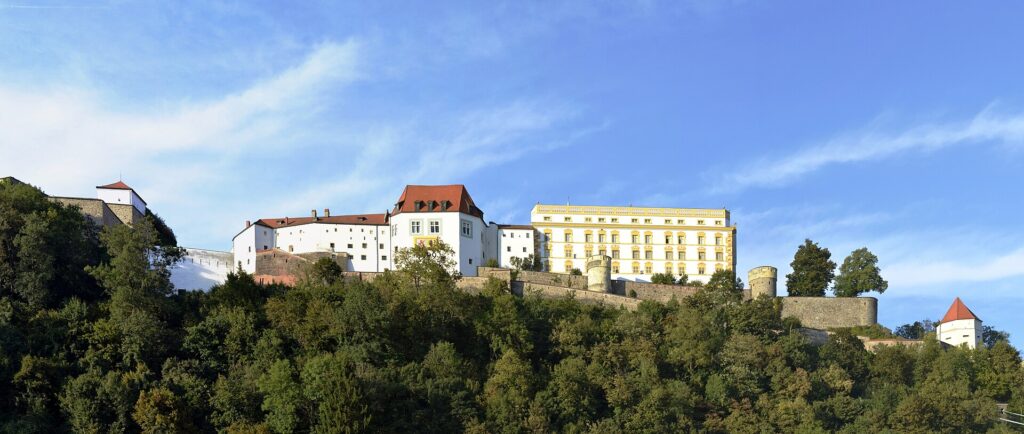 Veste Oberhaus fortress on the wooded hill above the Danube